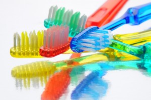 Toothbrushes on Reflective Surface