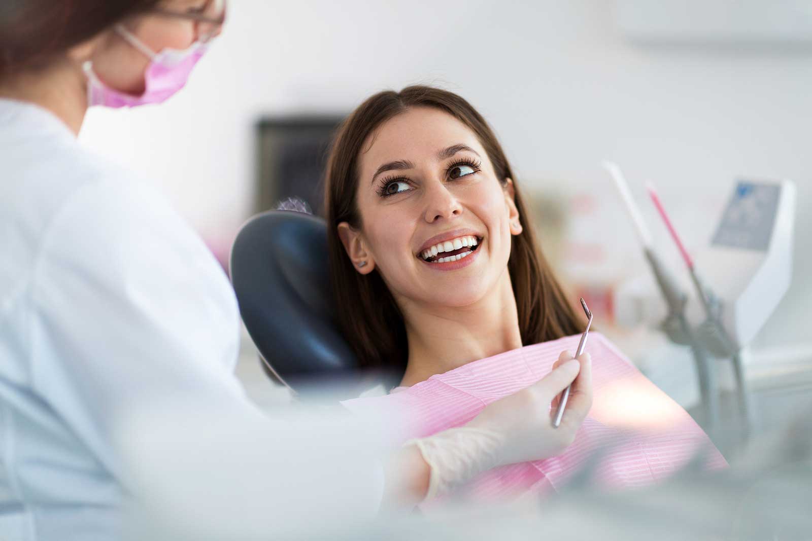 Smiling woman at dentist