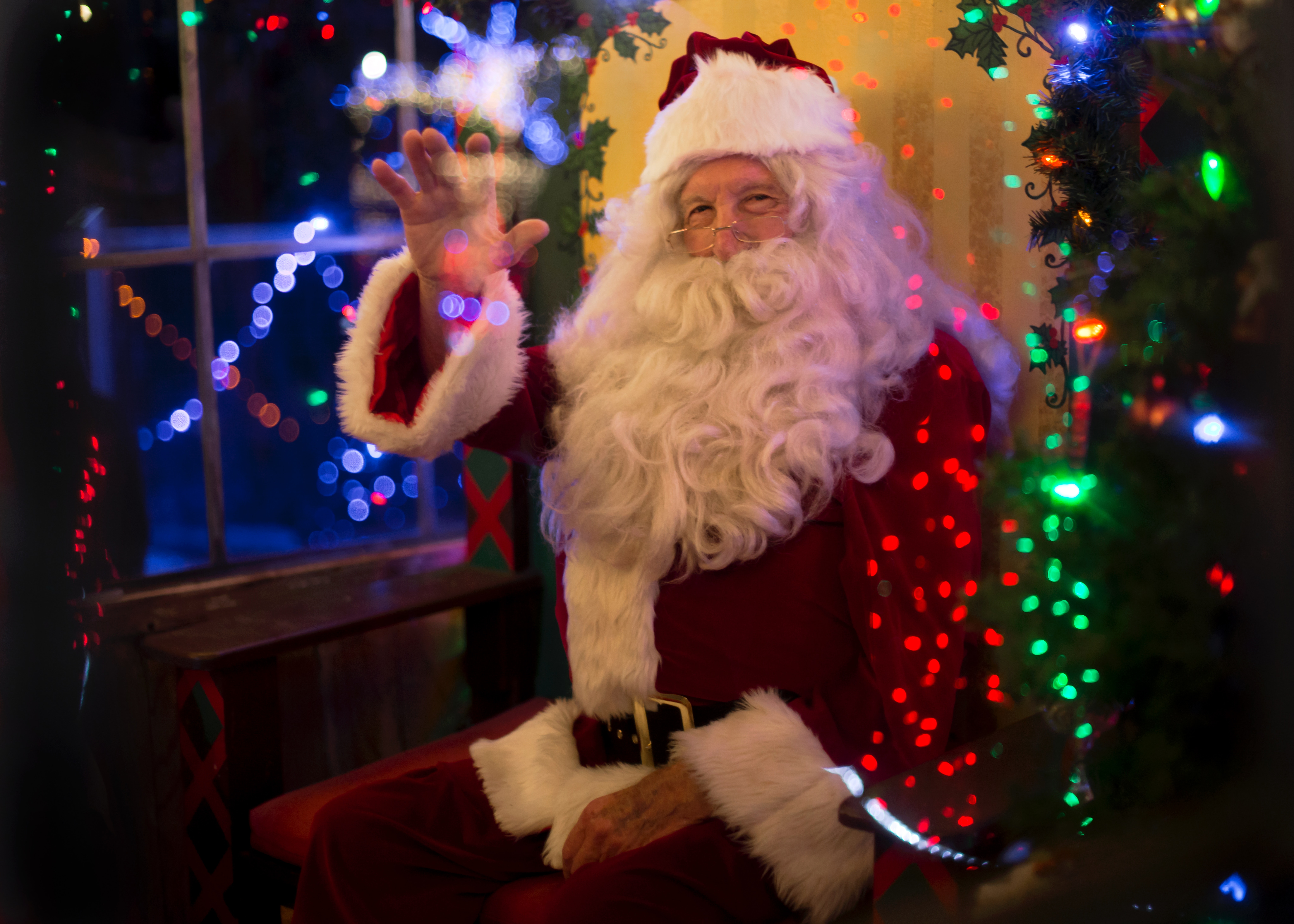 Santa Clause waving his hand